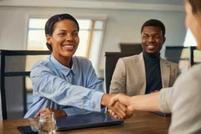 new employees handshake in a professional setting